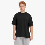 Person wearing a black t-shirt with a logo on a white background
