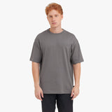Man wearing a gray t-shirt on a white background