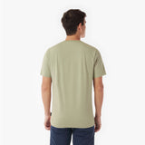 Back picture of a man wearing a light green t-shirt on a white background