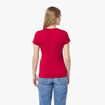 Back view of a woman wearing a red t-shirt and blue jeans on a white background