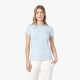 Woman wearing a light blue t-shirt on a white background