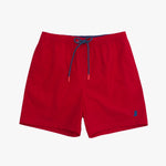 Red shorts with a small logo on a white background