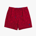 Red swim shorts with a subtle pattern on a white background