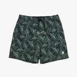 Tropical leaf patterned shorts on a white background