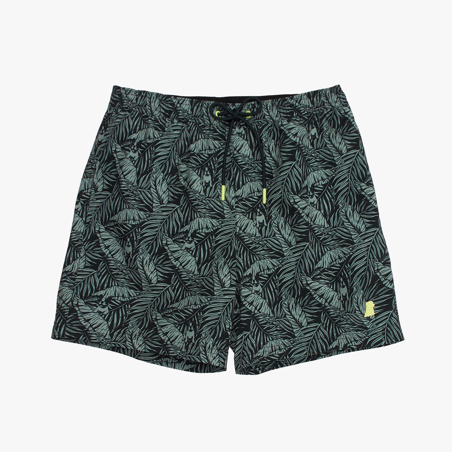 Tropical leaf patterned shorts on a white background