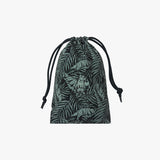 Drawstring bag with leaf pattern on a light gray background