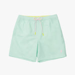 Light green shorts with a drawstring on a white background