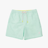 Light green shorts with a drawstring on a white background