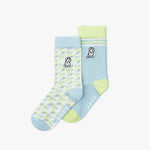 Two pairs of socks with cartoon dog designs on a white background