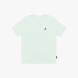 A pale mint green T-shirt with a small embroidered dog logo on the left chest, displayed flat