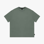 Green t-shirt with a small logo on a white background