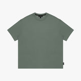 Green t-shirt with a small logo on a white background