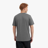 Back view of a man wearing a gray t-shirt on a white background