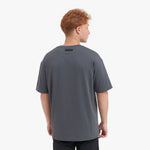 Back view of a man wearing a gray t-shirt on a white background