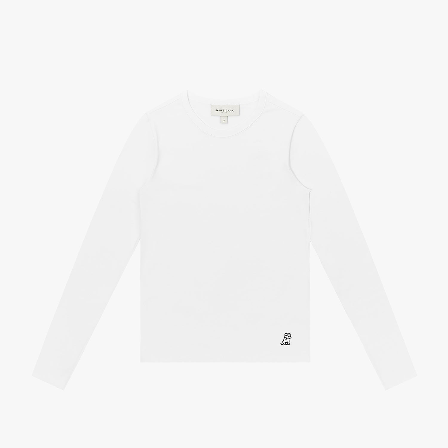 A flat lay shot of a white, long-sleeved crewneck t-shirt on a white background. A small, embroidered dog logo is on the bottom left hem.